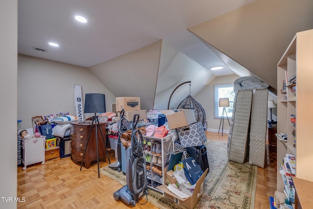 additional living space featuring light parquet floors and lofted ceiling