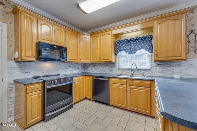 kitchen with sink, black appliances, crown molding, and light tile patterned floors