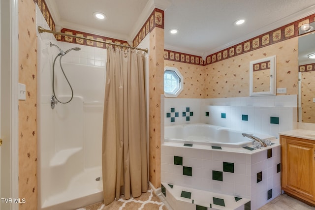 bathroom with tile walls, independent shower and bath, crown molding, and vanity