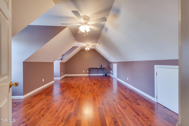 bonus room with hardwood / wood-style flooring, vaulted ceiling, and ceiling fan