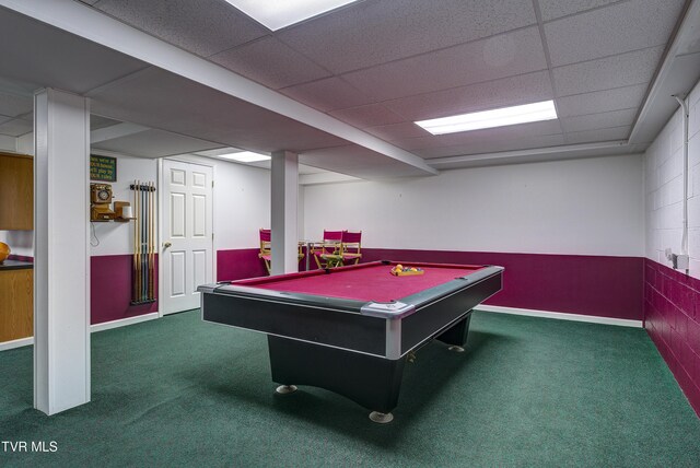 game room featuring dark colored carpet, a paneled ceiling, and billiards