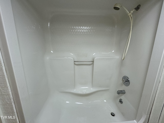 bathroom with shower / bathing tub combination