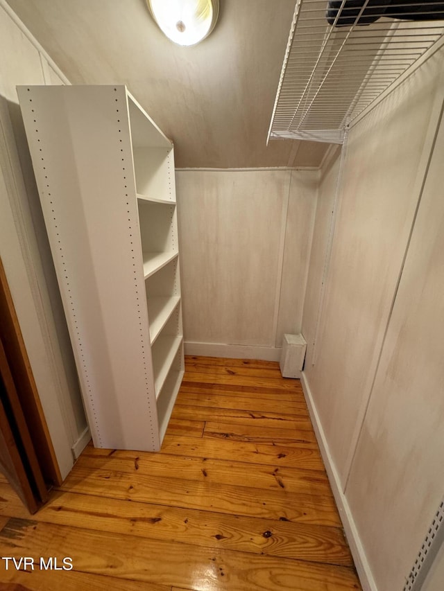 walk in closet featuring light hardwood / wood-style floors