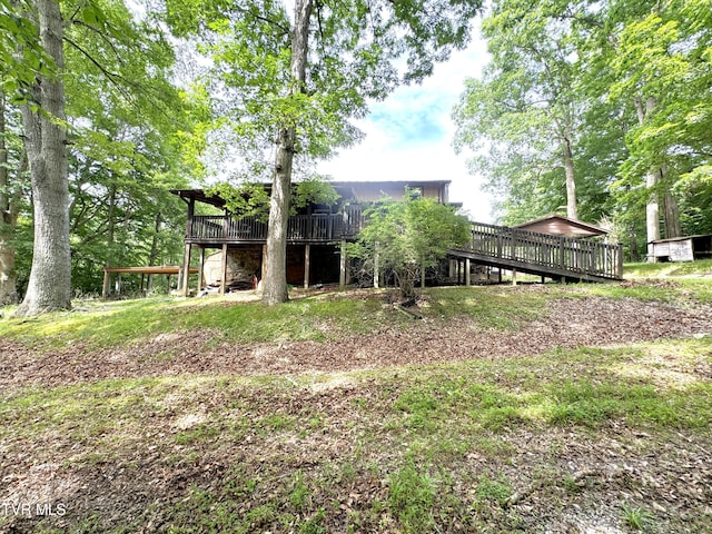 view of yard featuring a deck