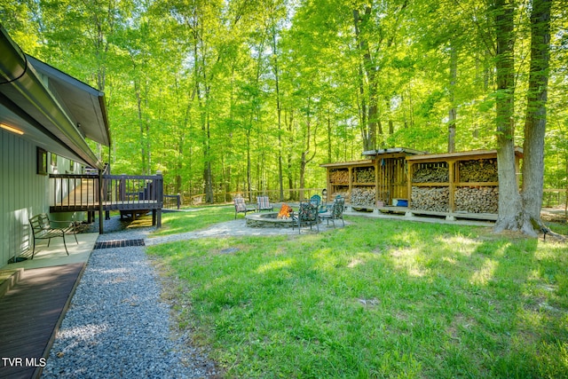 117 Lakeside Dr, Gray, TN 37615 - view of yard featuring a wooden deck and an outdoor fire pit