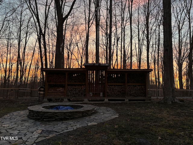 117 Lakeside Dr, Gray, TN 37615 - back house at dusk featuring a sunroom