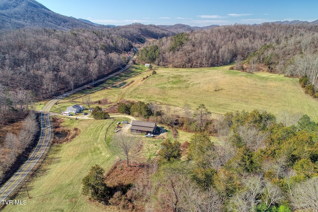 aerial view featuring a rural view and a mountain view