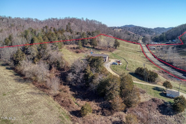 birds eye view of property featuring a rural view