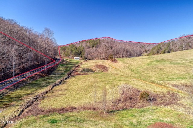 view of mountain feature featuring a rural view