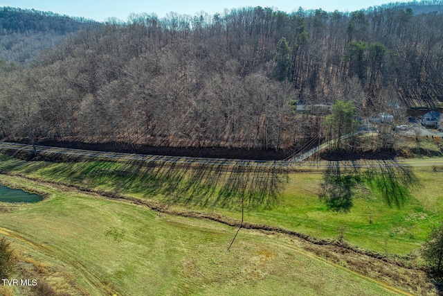 birds eye view of property featuring a rural view