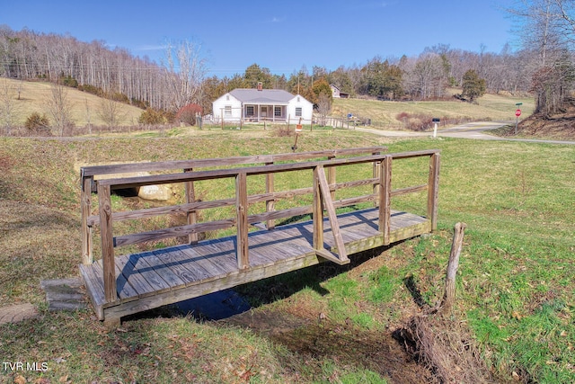 dock area featuring a rural view and a deck