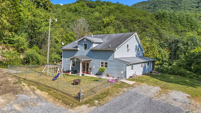 view of front of home with a front lawn