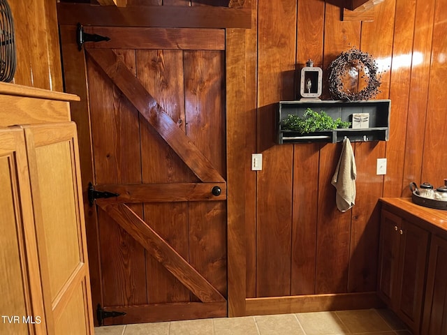 room details featuring wood walls