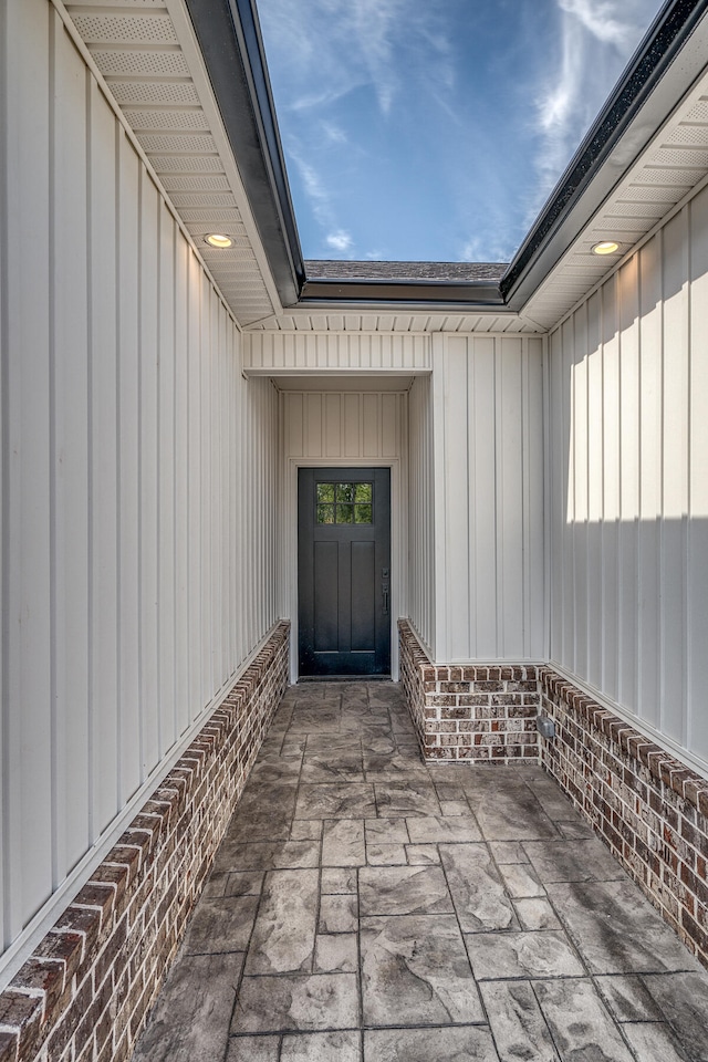 entrance to property with a patio area