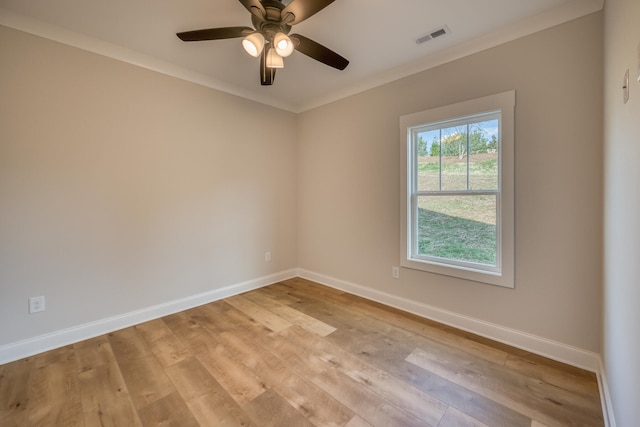 unfurnished room with crown molding, ceiling fan, and light wood-type flooring