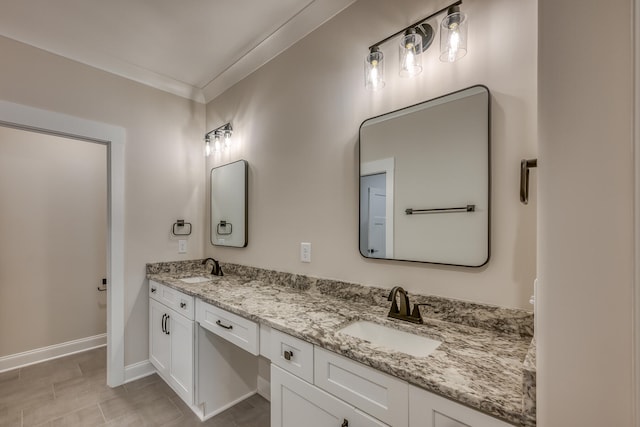 bathroom featuring double sink vanity, tile flooring, and crown molding