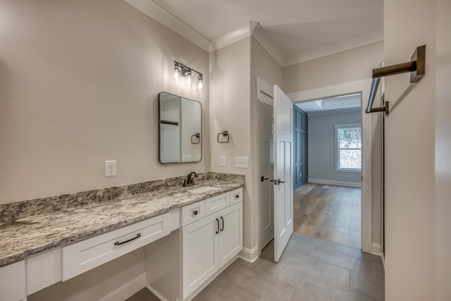 bathroom featuring ornamental molding, tile flooring, and large vanity