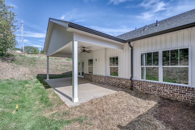 exterior space featuring ceiling fan