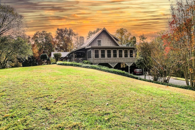 570 Stephen Brooks Rd, Greeneville, TN 37743 - back of property with a sunroom and a lawn
