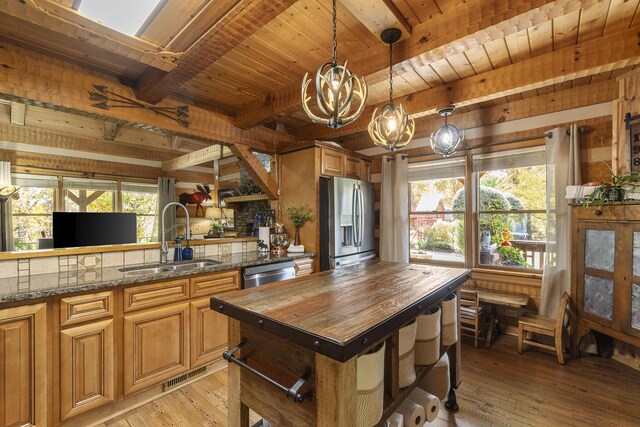 570 Stephen Brooks Rd, Greeneville, TN 37743 - kitchen featuring appliances with stainless steel finishes, a sink, wood ceiling with exposed beams, wood counters, and a chandelier