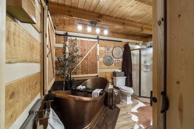 570 Stephen Brooks Rd, Greeneville, TN 37743 - bathroom featuring wooden ceiling, toilet, wood finished floors, a shower stall, and a freestanding bath