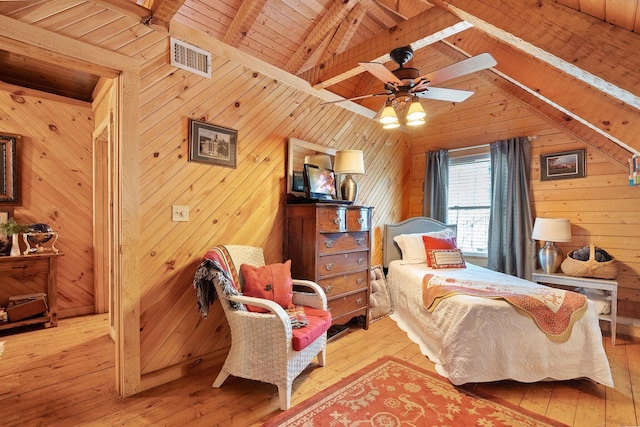 570 Stephen Brooks Rd, Greeneville, TN 37743 - bedroom featuring hardwood / wood-style floors, wooden walls, wooden ceiling, and a ceiling fan