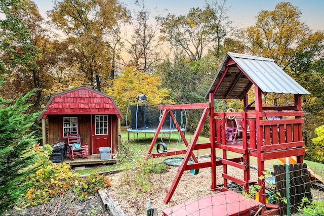 570 Stephen Brooks Rd, Greeneville, TN 37743 - view of yard featuring a trampoline, a playground, and view of wooded area