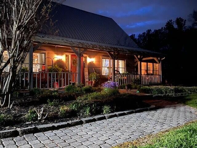 570 Stephen Brooks Rd, Greeneville, TN 37743 - back of house featuring covered porch and metal roof
