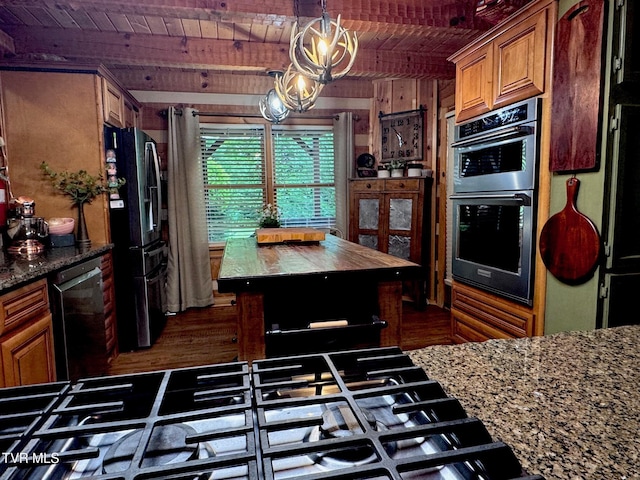 570 Stephen Brooks Rd, Greeneville, TN 37743 - kitchen featuring stainless steel appliances, wood ceiling with exposed beams, dark wood-style flooring, wood counters, and brown cabinetry