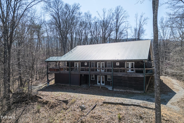 view of front of property featuring a wooden deck