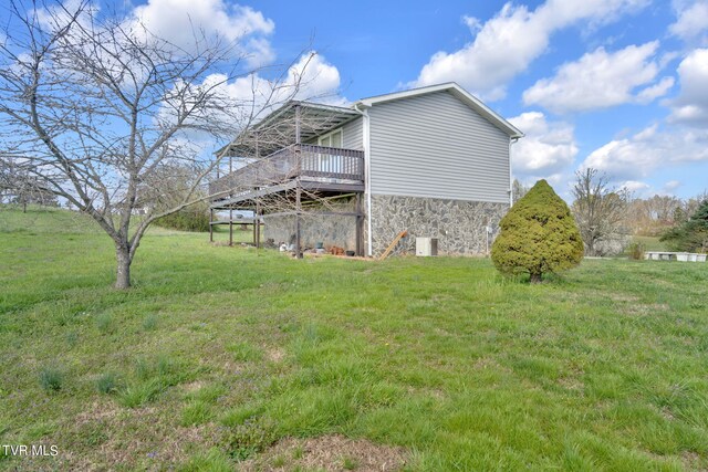 545 Mcmillian Rd, Midway, TN 37809 - exterior space featuring a wooden deck and a yard