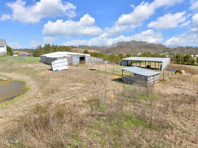 545 Mcmillian Rd, Midway, TN 37809 - view of yard with a rural view and a carport