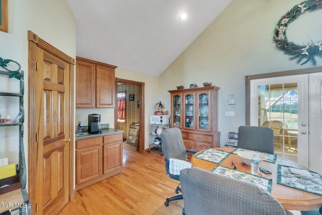 545 Mcmillian Rd, Midway, TN 37809 - office space featuring high vaulted ceiling and light hardwood / wood-style flooring