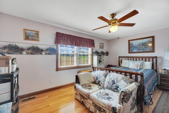 545 Mcmillian Rd, Midway, TN 37809 - bedroom with ceiling fan and light hardwood / wood-style flooring