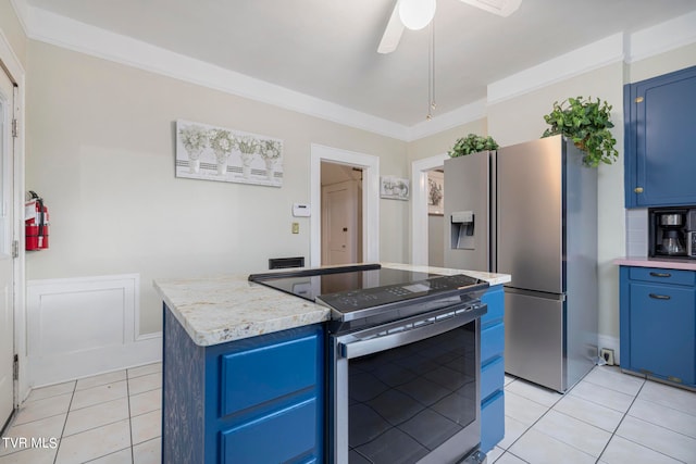 kitchen with blue cabinets, a kitchen island, ceiling fan, and appliances with stainless steel finishes