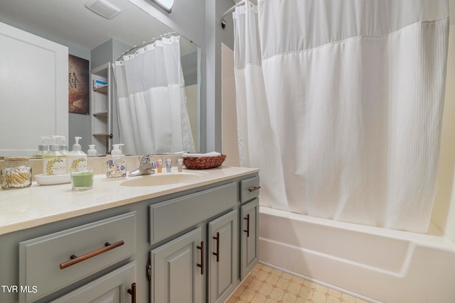 bathroom with shower / bath combination with curtain, tile floors, and vanity