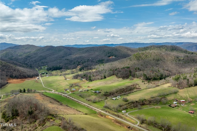 aerial view featuring a mountain view and a rural view