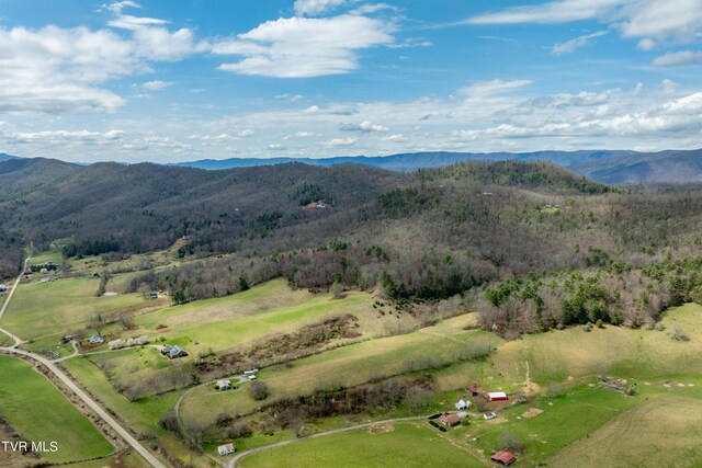 bird's eye view with a mountain view and a rural view