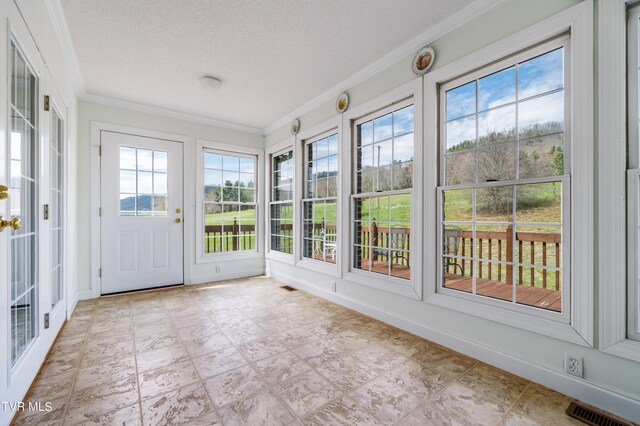 view of unfurnished sunroom