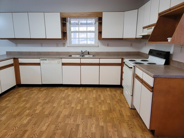 kitchen featuring light hardwood / wood-style flooring, white cabinetry, and white appliances