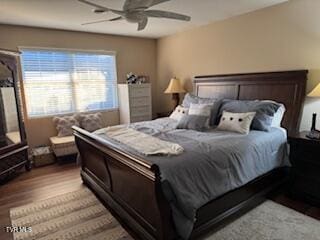 bedroom featuring ceiling fan and wood finished floors