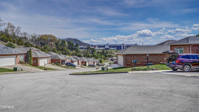 exterior space featuring a mountain view and a residential view