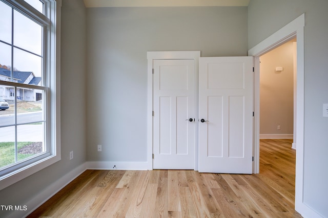 unfurnished bedroom featuring light hardwood / wood-style floors