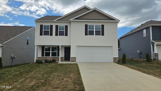 craftsman house with a front yard and a garage