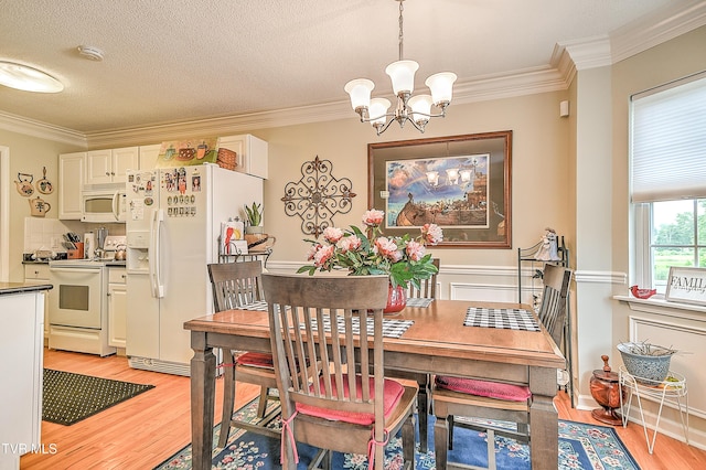 110 Eagle View Private Dr Unit 110, Blountville, TN 37617 - dining area featuring a chandelier, crown molding, and light wood finished floors