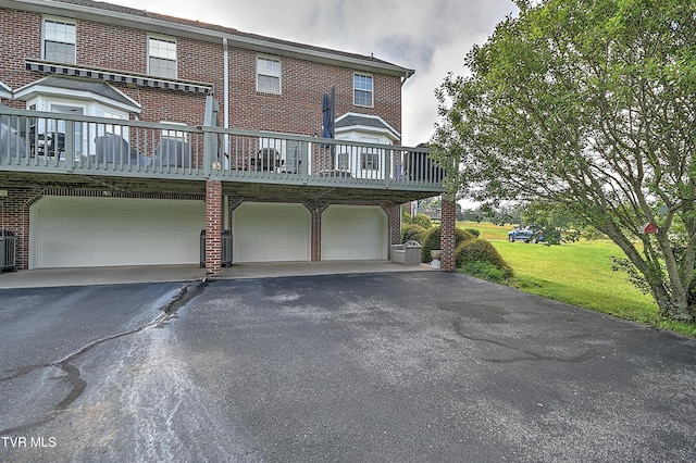 110 Eagle View Private Dr Unit 110, Blountville, TN 37617 - townhome / multi-family property with brick siding, an attached garage, driveway, and a front lawn