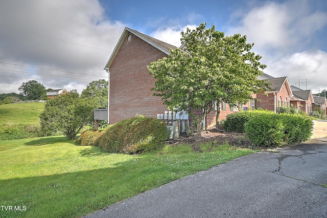110 Eagle View Private Dr Unit 110, Blountville, TN 37617 - view of side of home featuring brick siding and a yard
