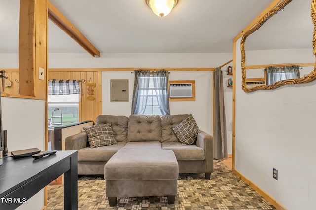 living room with beam ceiling and an AC wall unit