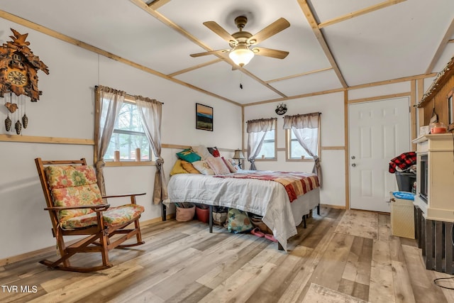 bedroom with ceiling fan and hardwood / wood-style floors