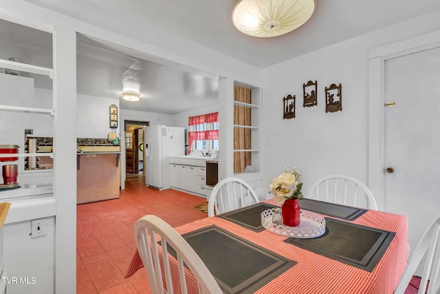 view of tiled dining space